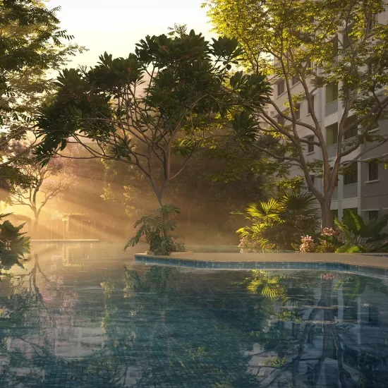 A swimming pool among tropical gardens at SOBHA Ayana